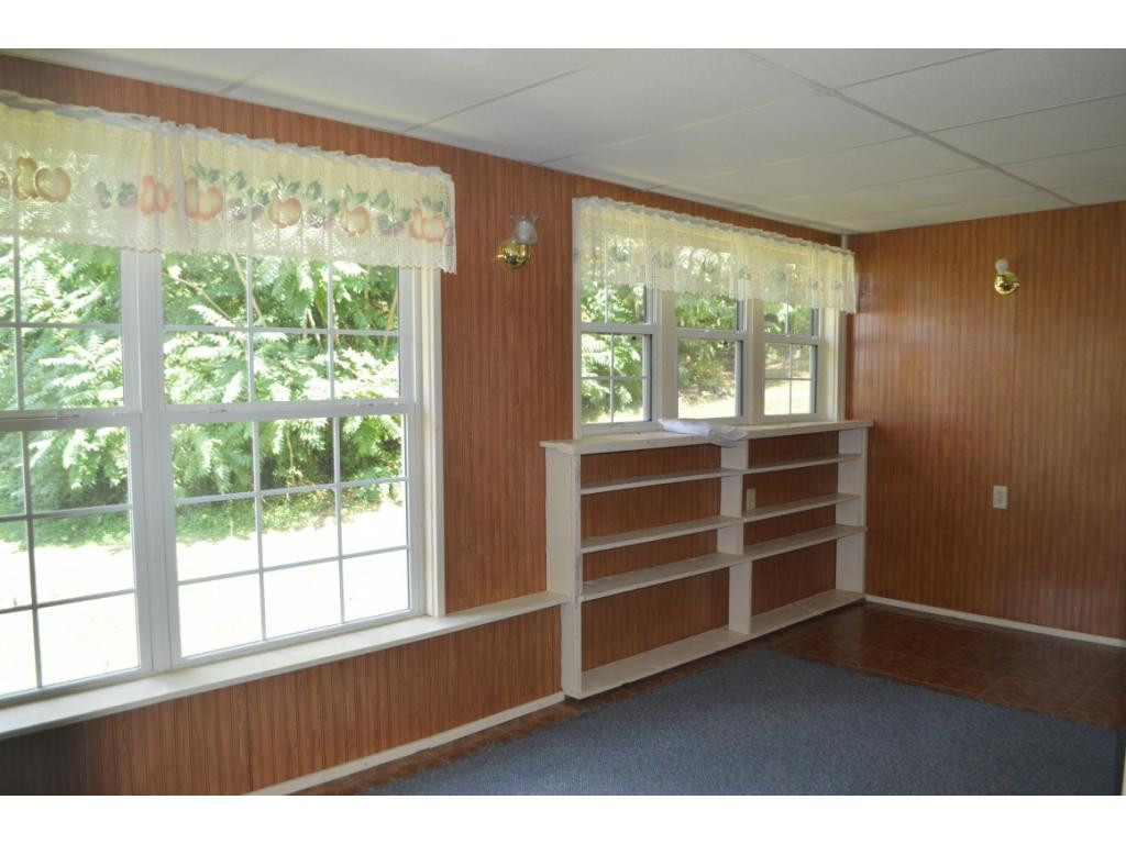 240 Shackleford Road Mosheim, TN 37818 - Photo 8 of 18 Enclosed porchsunroom area