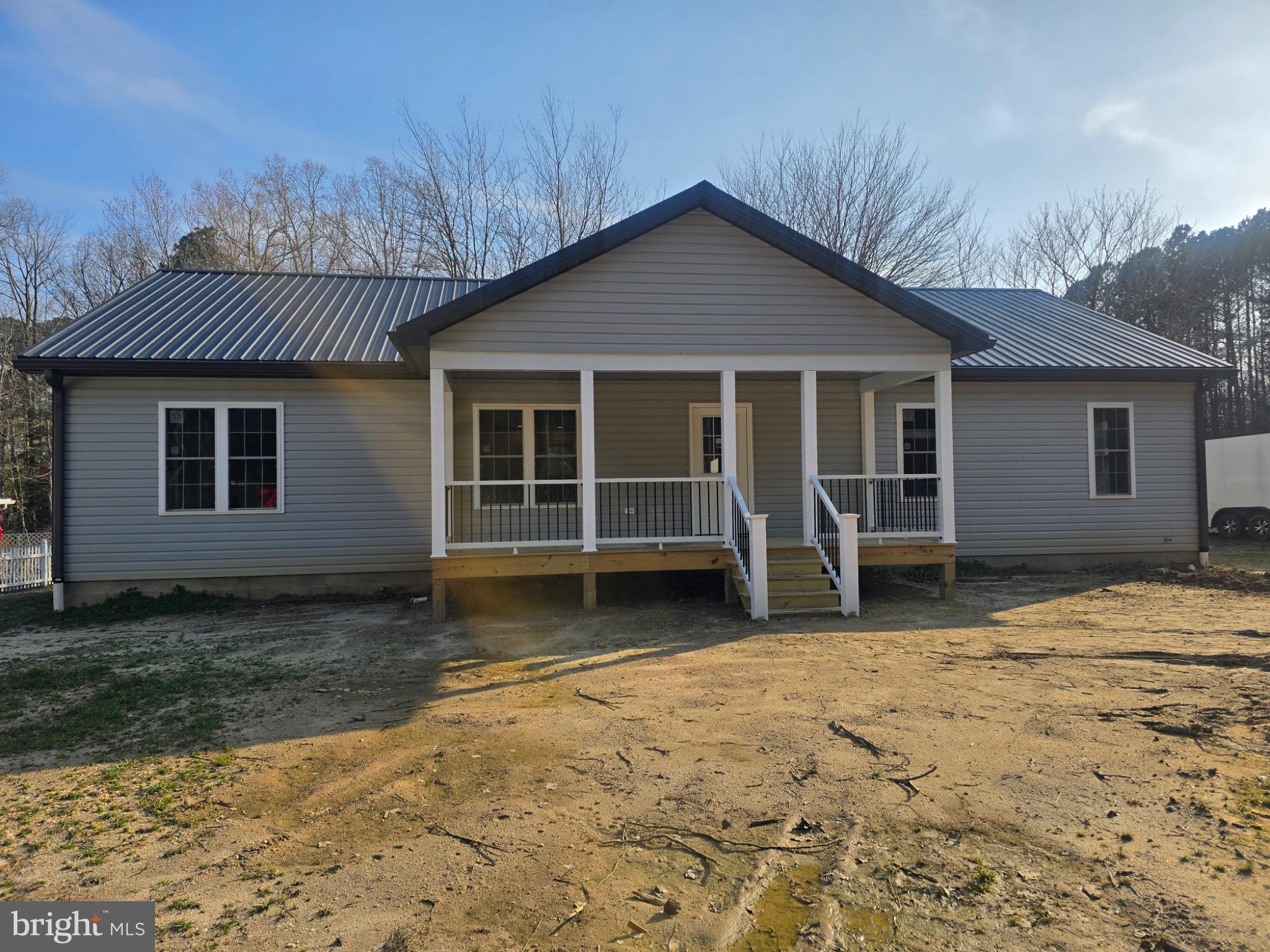 Charming home with inviting front porch.