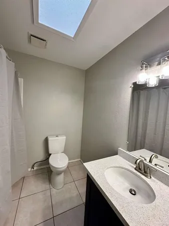 a bathroom with a sink and a toilet