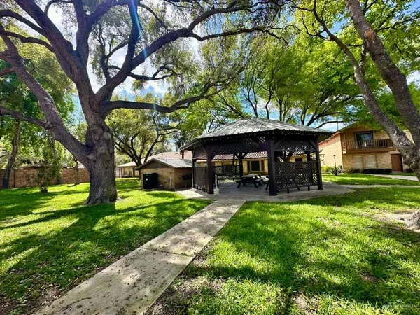 a view of a house with a big yard