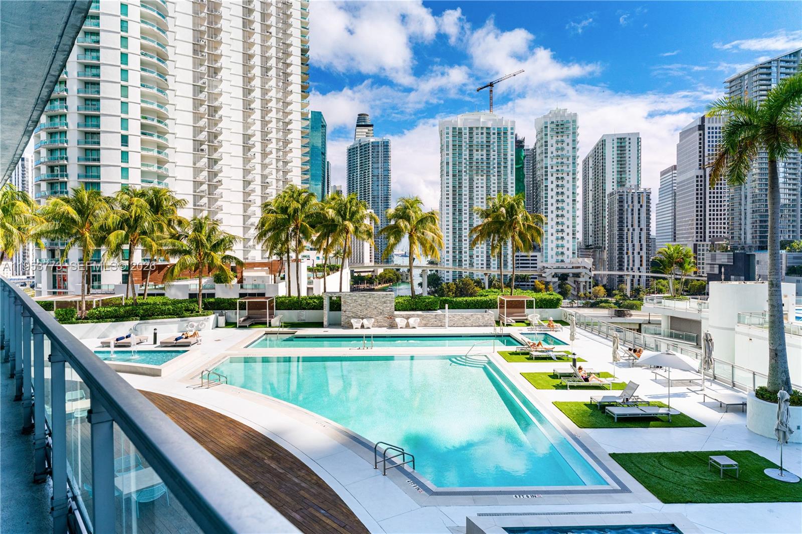 90 Southwest 3rd Street, Unit 1115 Miami, FL 33130 - Photo 16 of 17 a view of swimming pool with outdoor seating and city view