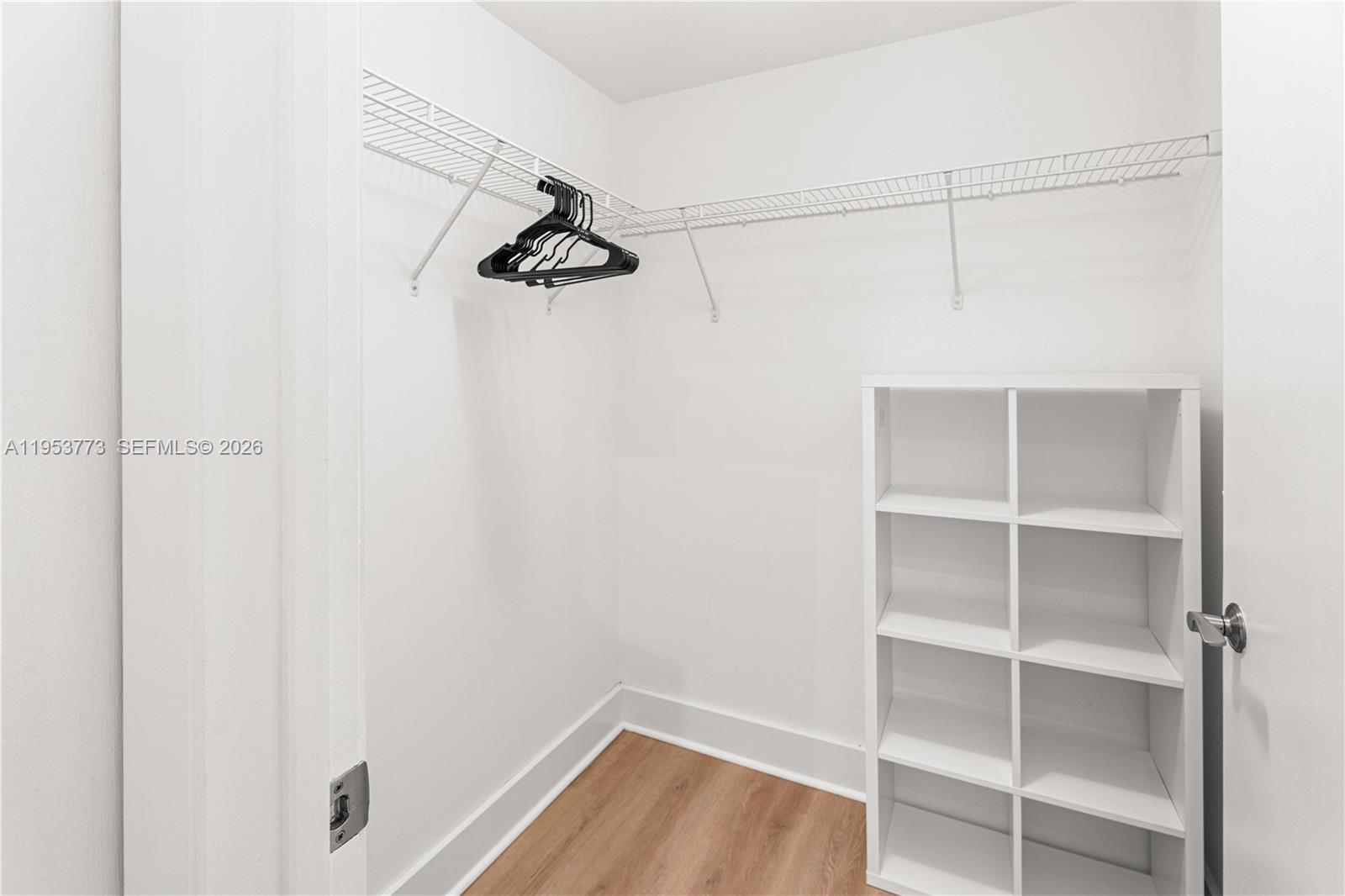 90 Southwest 3rd Street, Unit 1115 Miami, FL 33130 - Photo 8 of 17 a view of a room with shelf on the wall