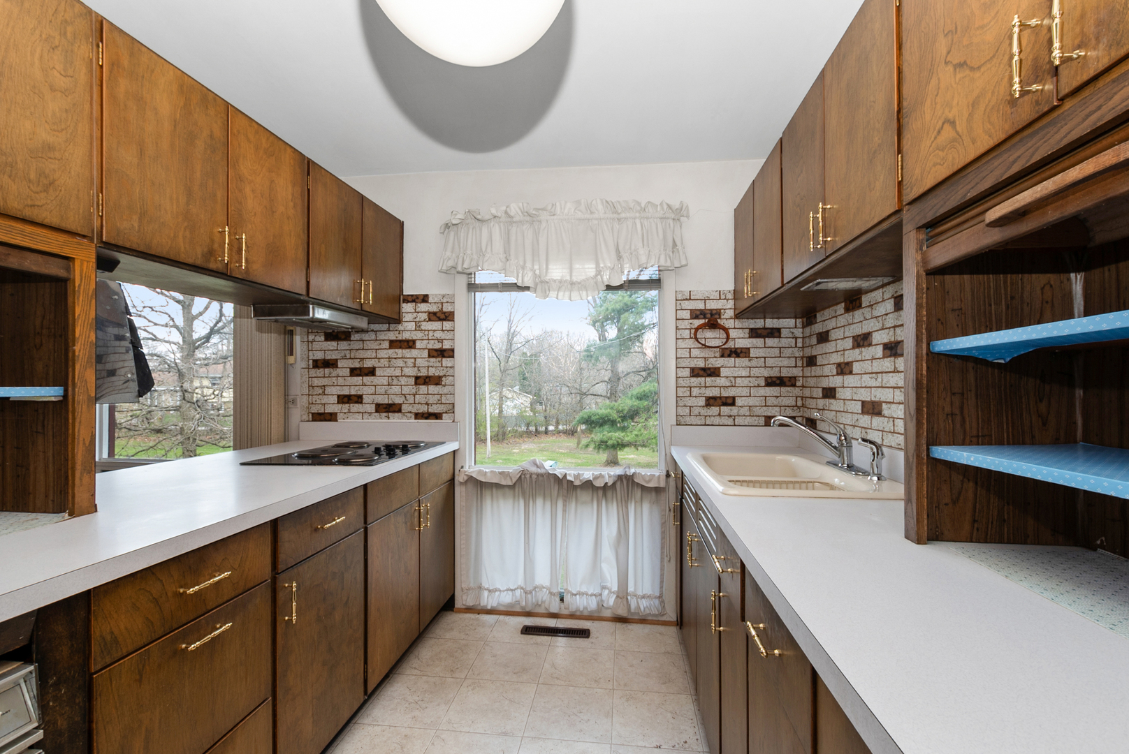 20009 East Brightway Road Mokena, IL 60448 - Photo 15 of 37 a kitchen with refrigerator and cabinets