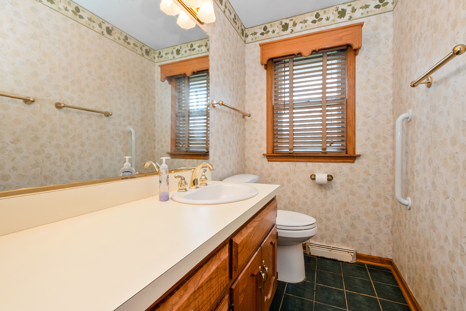 20009 East Brightway Road Mokena, IL 60448 - Photo 22 of 37 a bathroom with a sink a toilet and shower