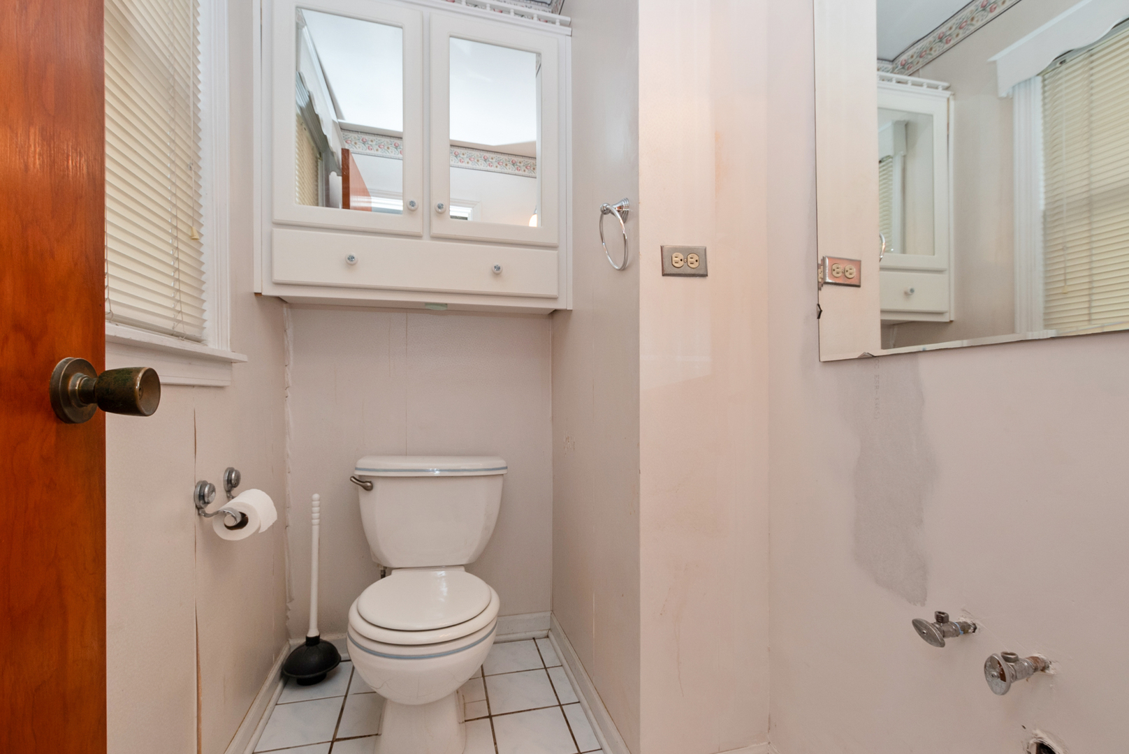 20009 East Brightway Road Mokena, IL 60448 - Photo 34 of 37 a white toilet sitting next to a bathroom sink
