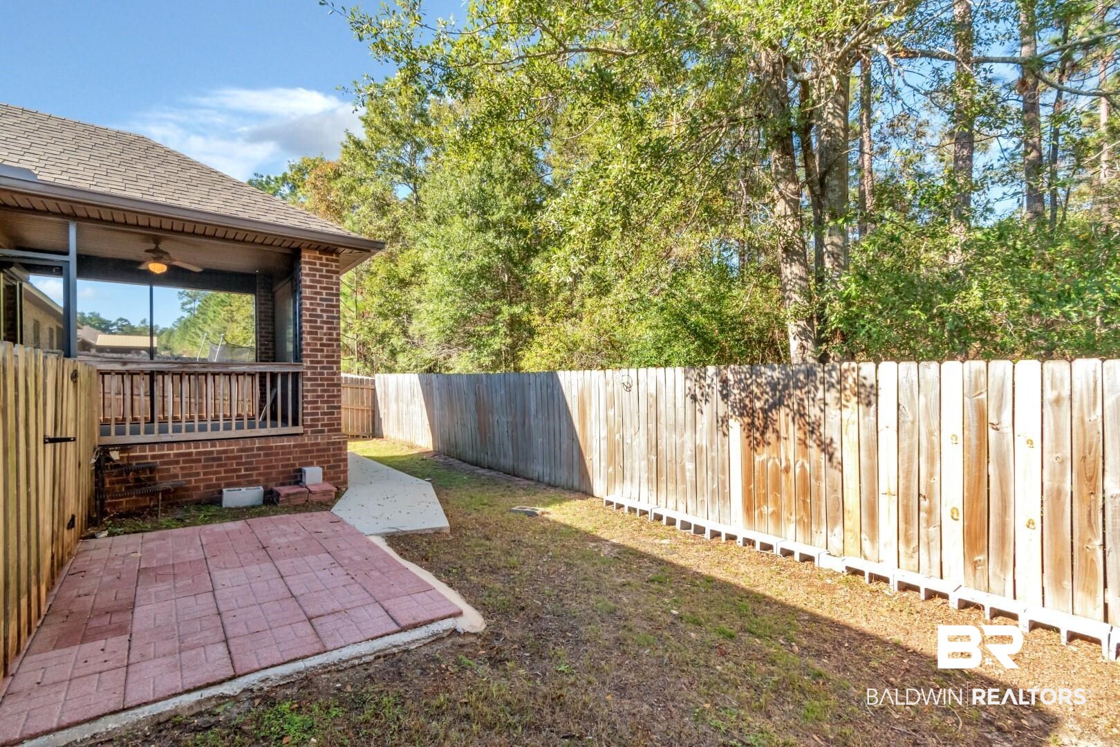 6144 Whitebark Drive Mobile, AL 36693 - Photo 24 of 33 View of yard featuring ceiling fan and a patio area