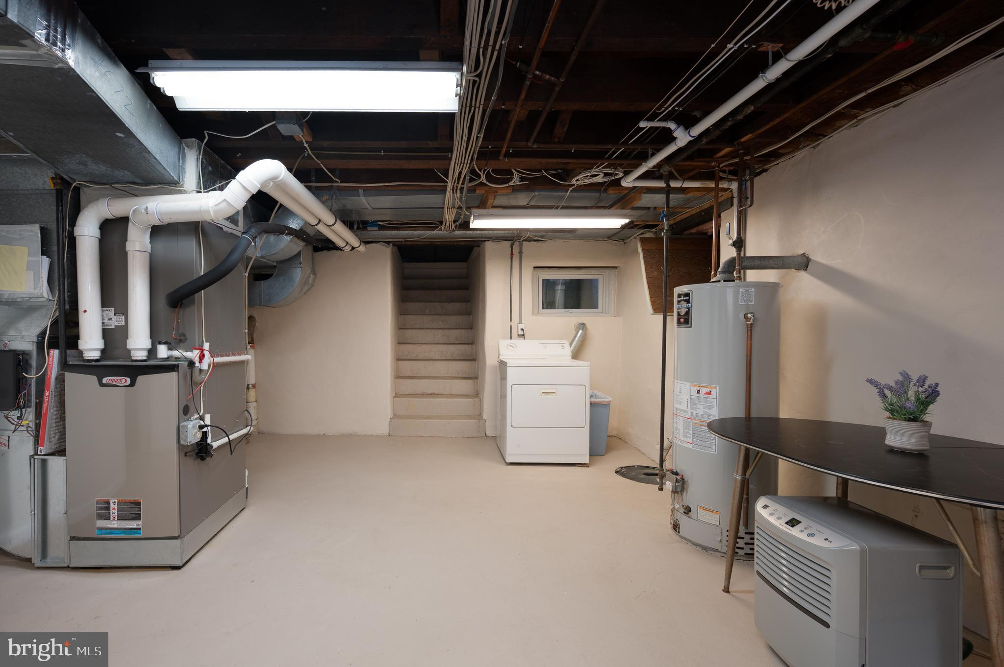 1507 Spring Lane Wilmington, DE 19809 - Photo 36 of 51 Basement utility room with outside stairs