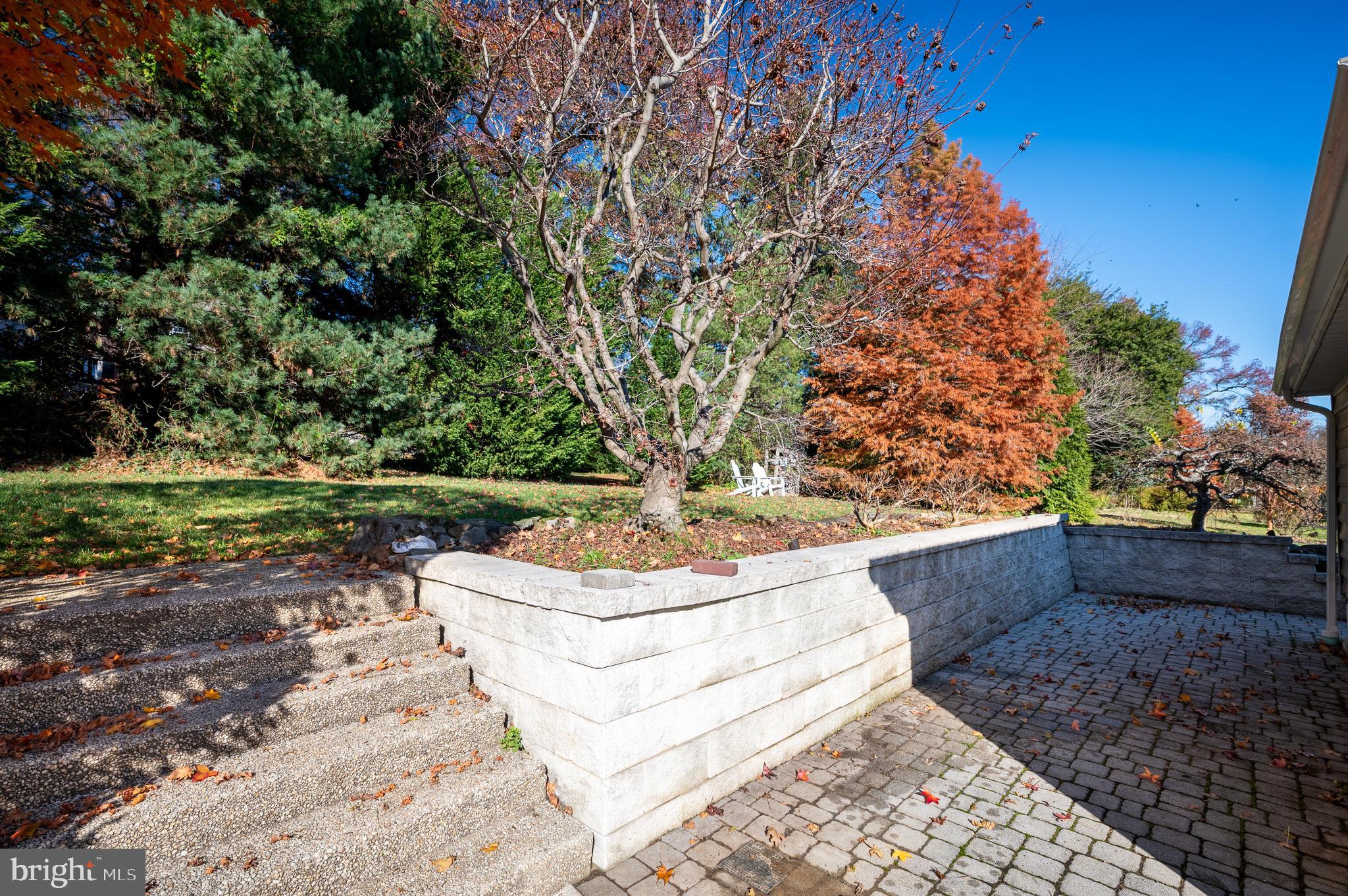 1507 Spring Lane Wilmington, DE 19809 - Photo 43 of 51 Paver path to the back patio