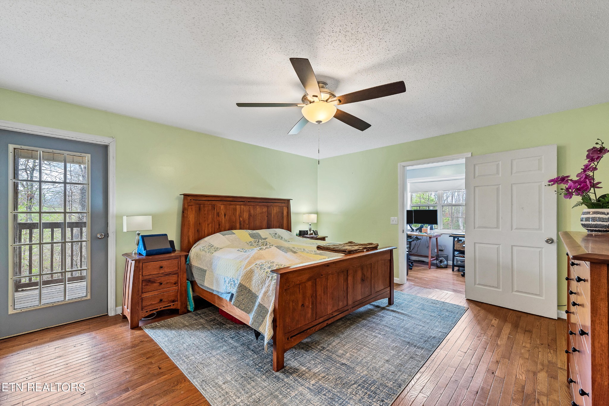 165 Colditz Oneida, TN 37841 - Photo 27 of 57 a bedroom with a bed chandelier and a window