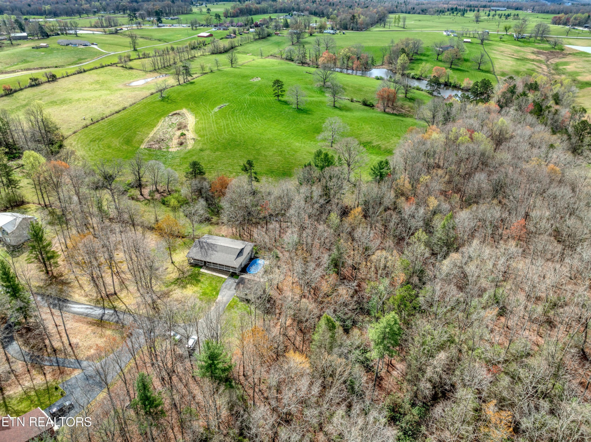 165 Colditz Oneida, TN 37841 - Photo 49 of 57 a backyard of a house with a yard and lake view