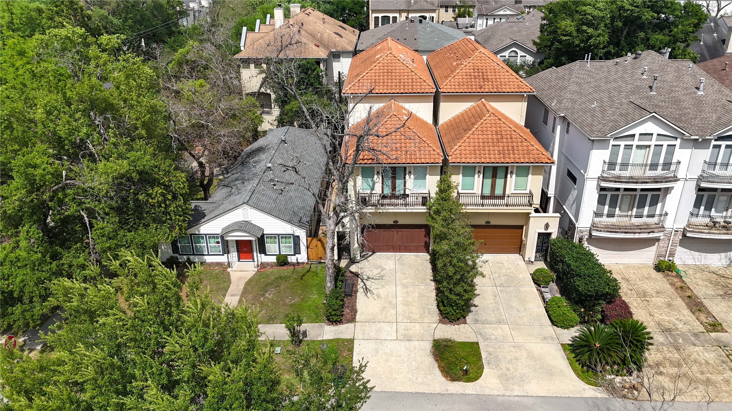 6520 Rodrigo Street Houston, TX 77007 - Photo 40 of 44 Aerial view showcasing the property's striking Mediterranean-style exterior and prominent corner-lot presence.