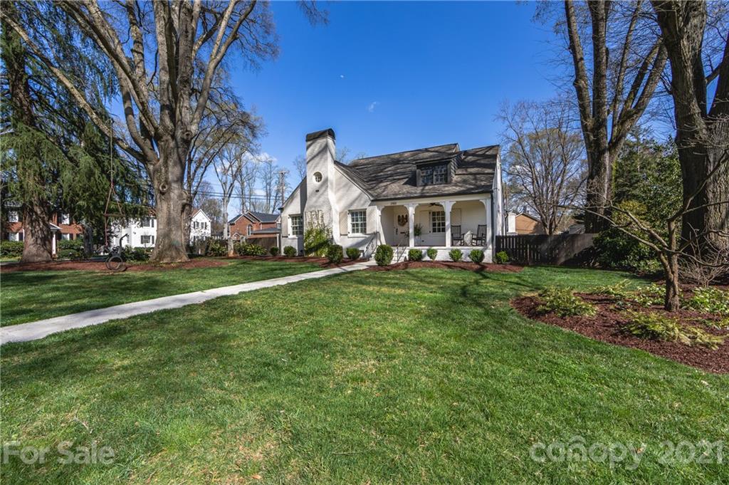 2901 Idlewood Circle Charlotte, NC 28209 - Photo 2 of 48 a front view of a building with a garden
