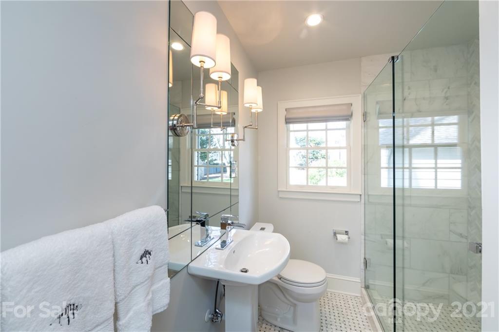 2901 Idlewood Circle Charlotte, NC 28209 - Photo 22 of 48 a bathroom with a sink toilet and shower