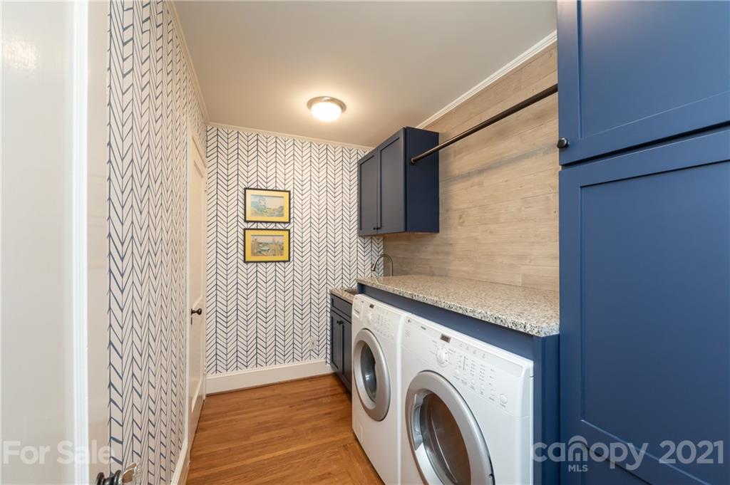 2901 Idlewood Circle Charlotte, NC 28209 - Photo 29 of 48 a view of a hallway with washer and dryer