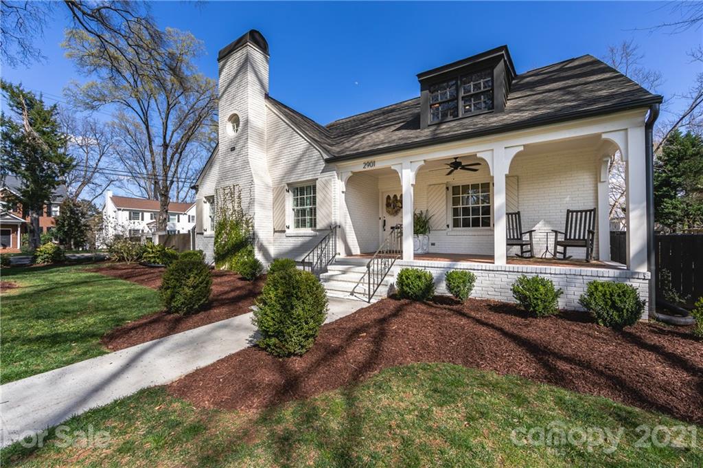 2901 Idlewood Circle Charlotte, NC 28209 - Photo 4 of 48 a front view of a house with garden