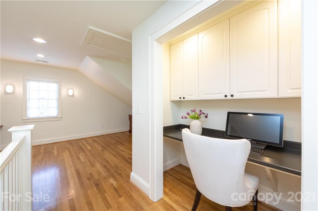 2901 Idlewood Circle Charlotte, NC 28209 - Photo 33 of 48 a living room with dining room and windows