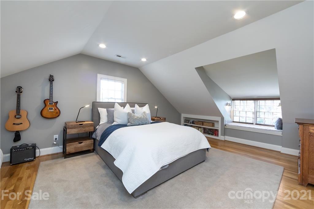 2901 Idlewood Circle Charlotte, NC 28209 - Photo 35 of 48 a bedroom with a bed and a window
