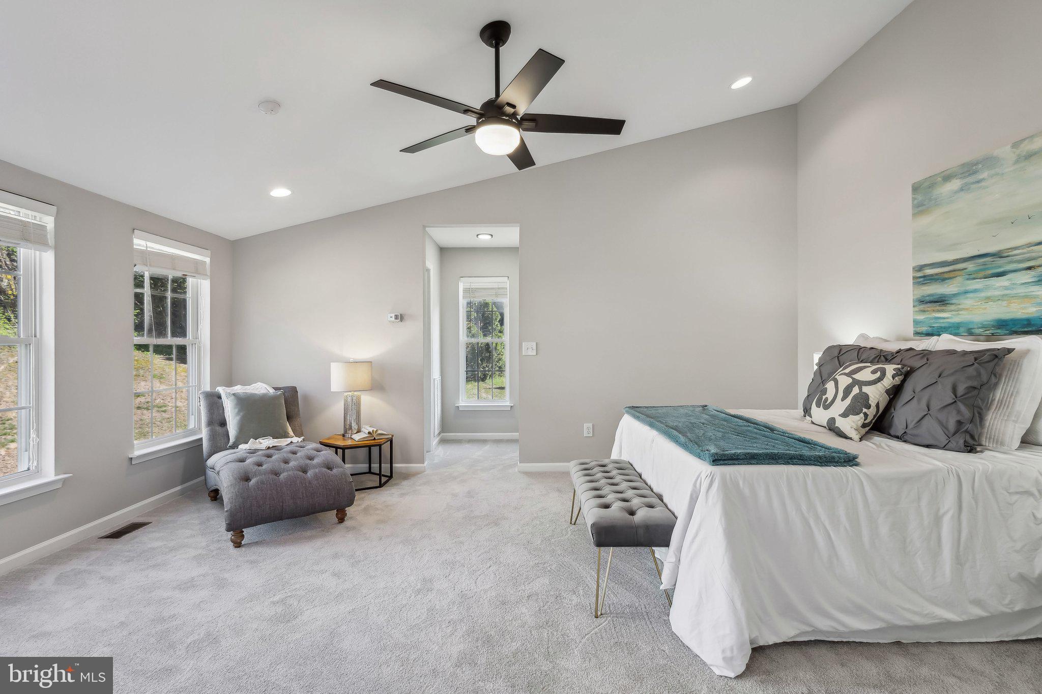 169 Basalt Drive Fredericksburg, VA 22406 - Photo 27 of 56 a bedroom with a bed and furniture