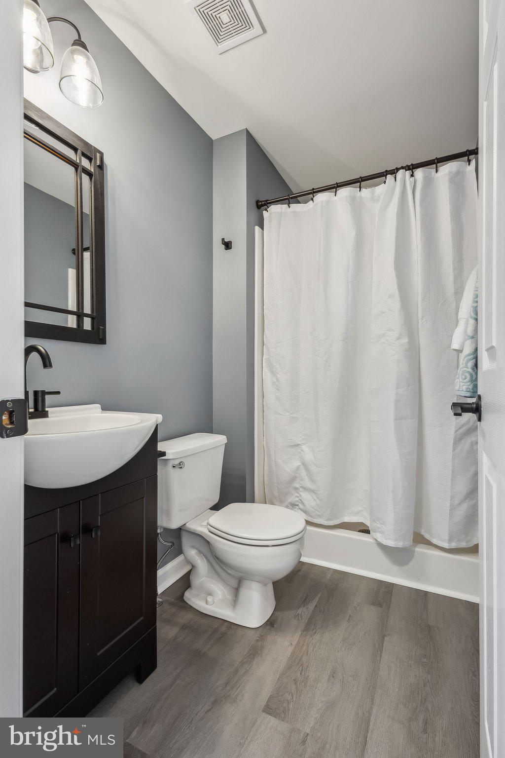 169 Basalt Drive Fredericksburg, VA 22406 - Photo 30 of 56 a bathroom with a sink toilet and shower