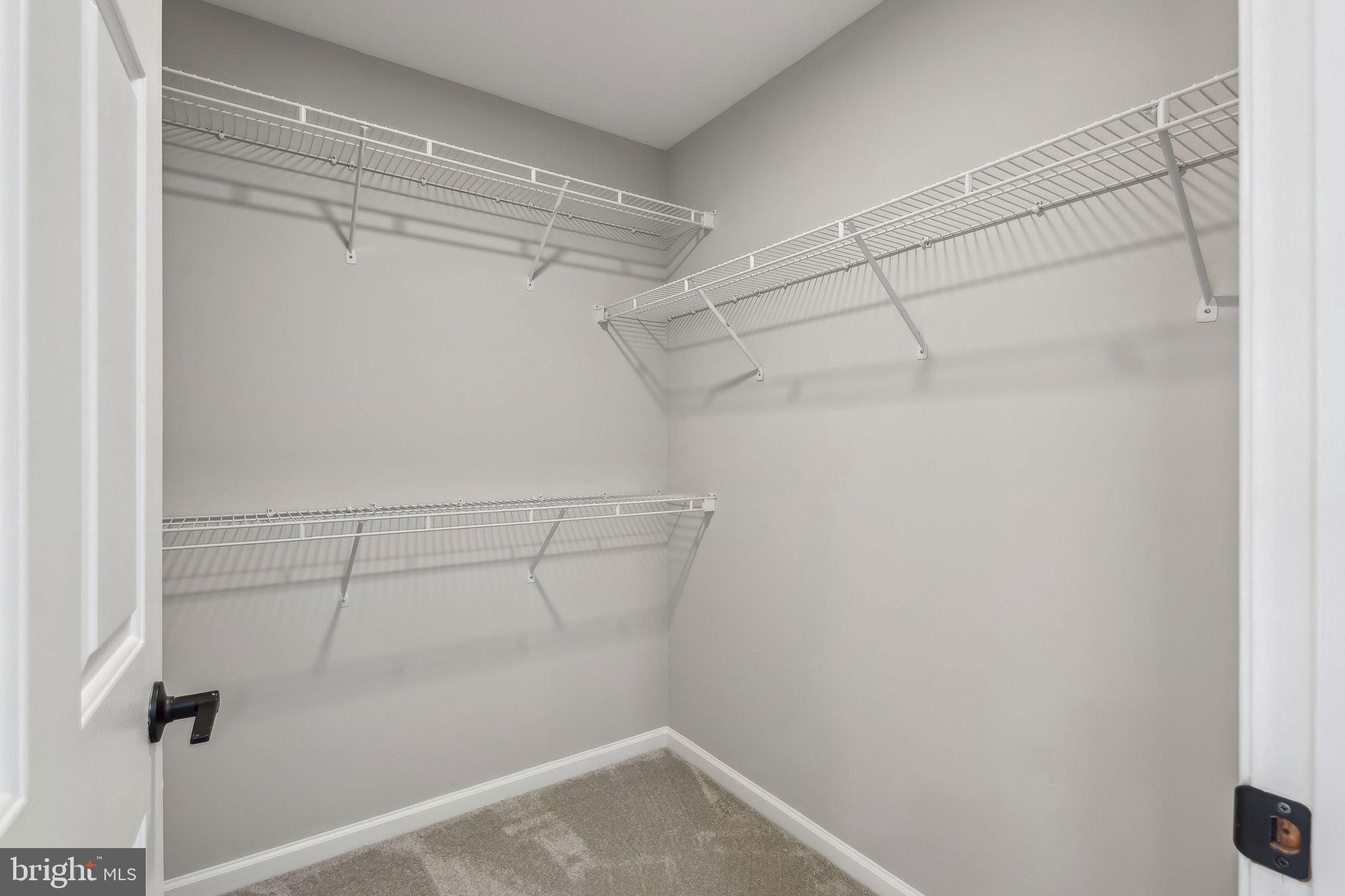 169 Basalt Drive Fredericksburg, VA 22406 - Photo 35 of 56 a view of a room with racks on the wall