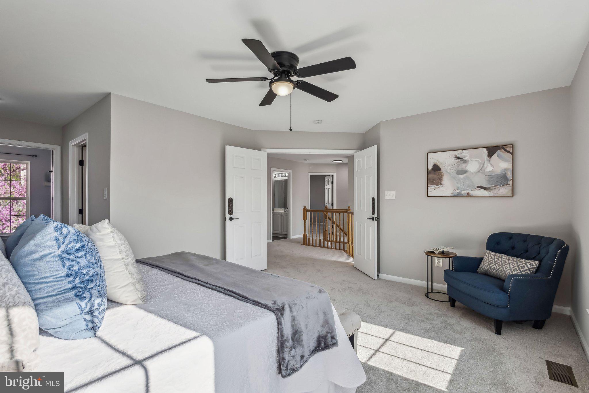 169 Basalt Drive Fredericksburg, VA 22406 - Photo 38 of 56 a bedroom with a bed couch and window