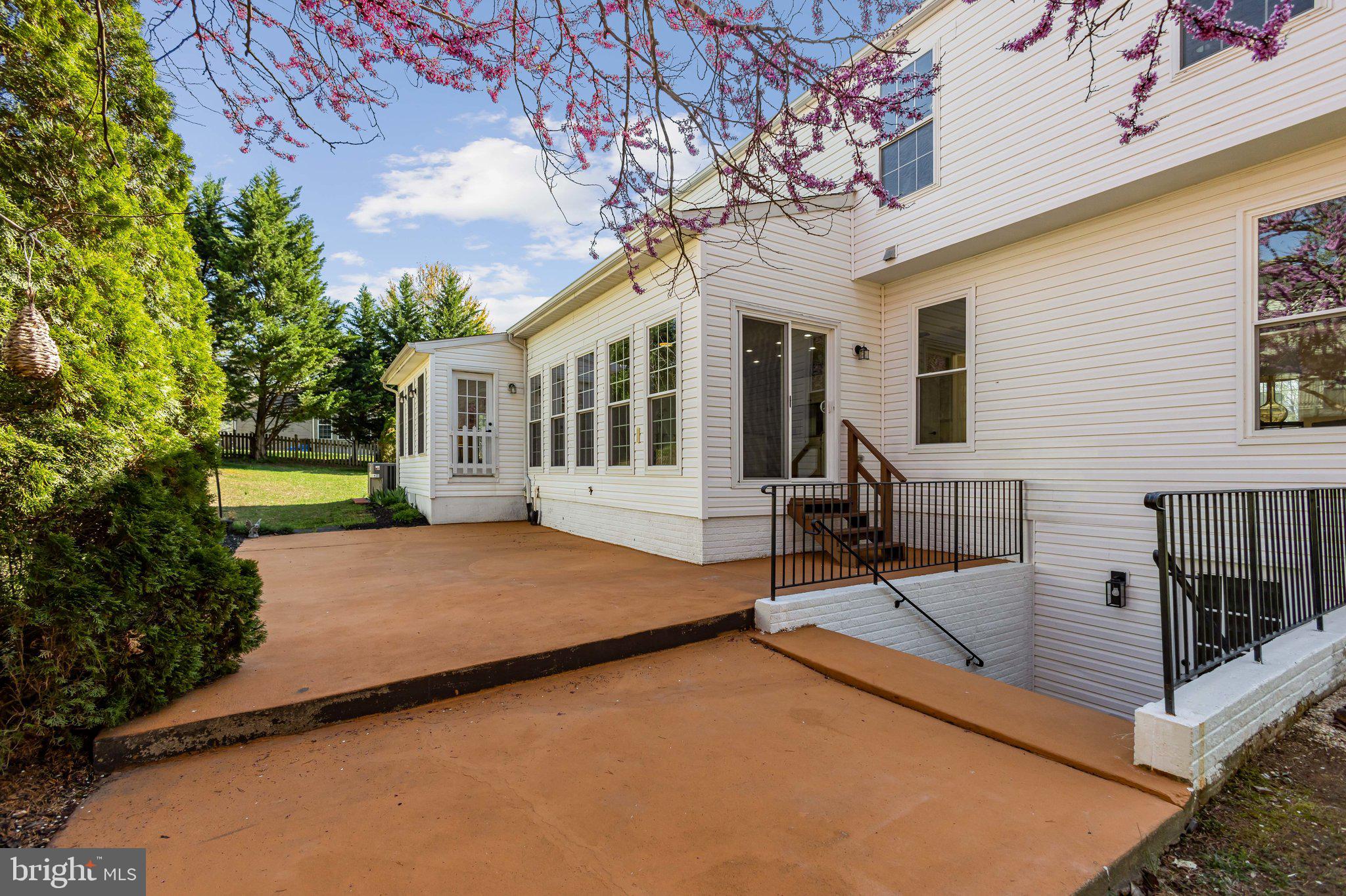 169 Basalt Drive Fredericksburg, VA 22406 - Photo 4 of 56 a view of house with yard outdoor seating and covered with trees