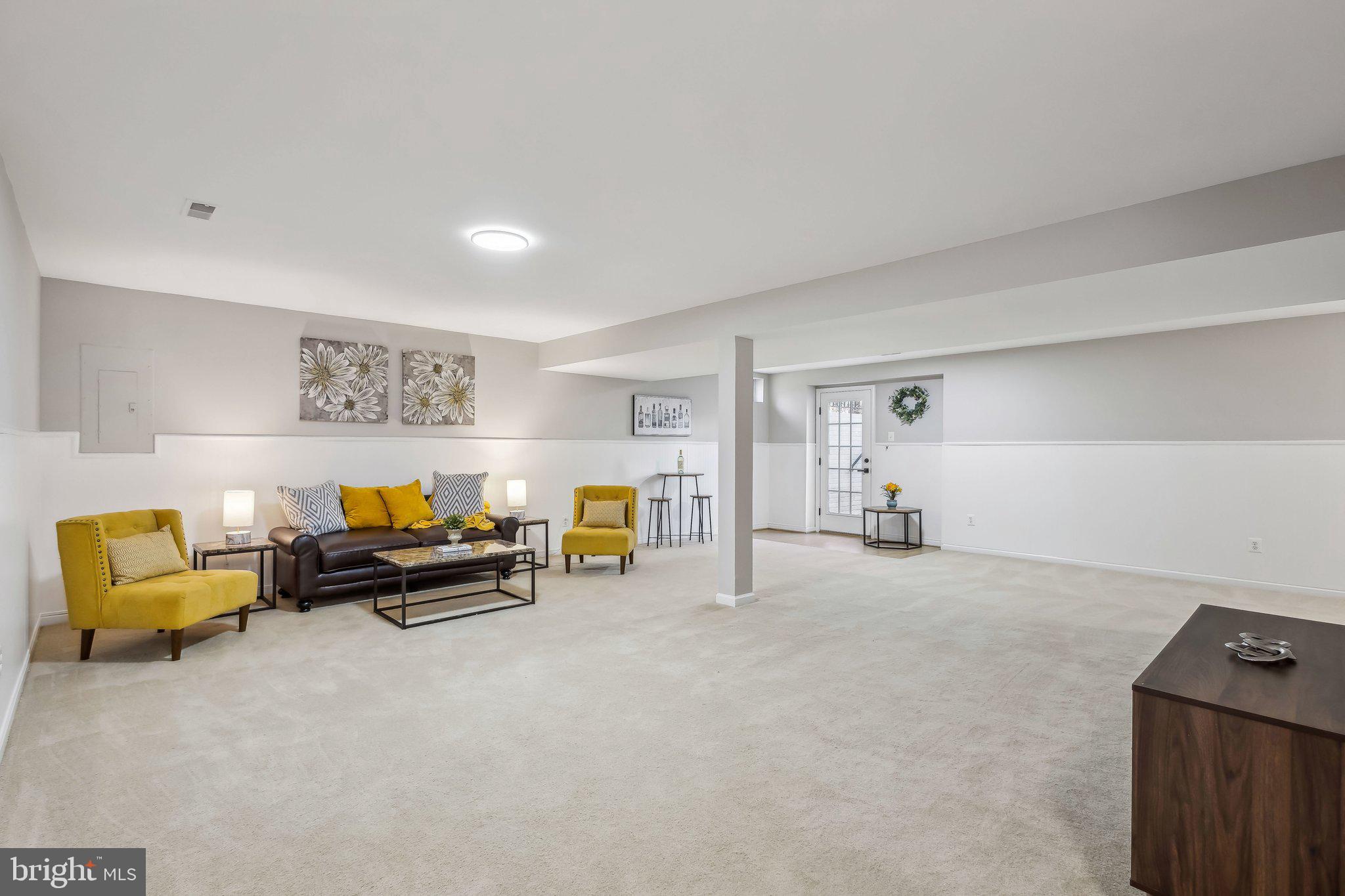 169 Basalt Drive Fredericksburg, VA 22406 - Photo 45 of 56 a living room with furniture and a couch