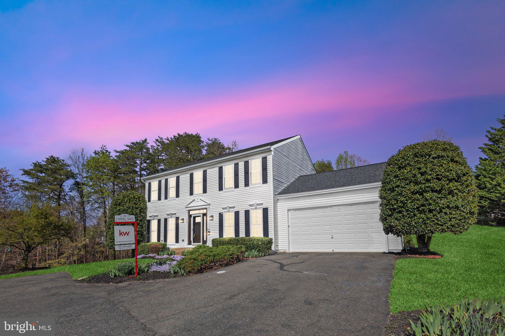 169 Basalt Drive Fredericksburg, VA 22406 - Photo 52 of 56 a front view of a house with a yard and a garage