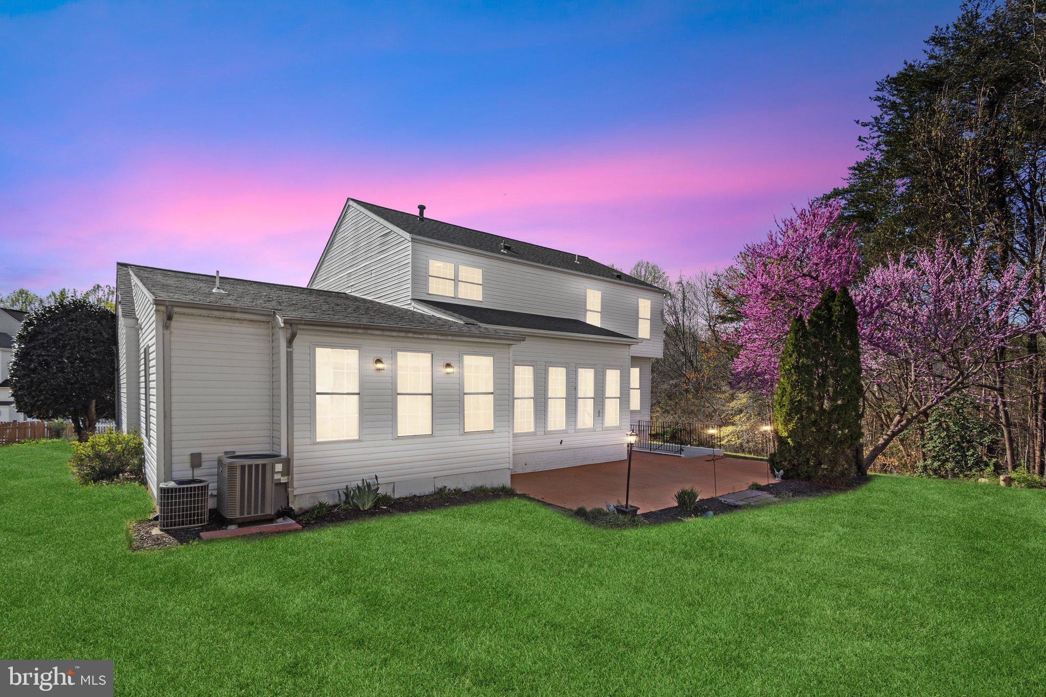 169 Basalt Drive Fredericksburg, VA 22406 - Photo 55 of 56 a front view of a house with a garden and yard
