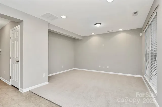 an empty room with a natural light