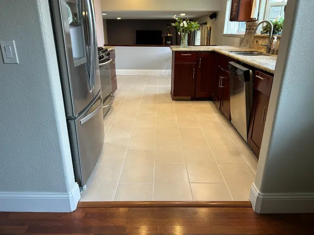 a view of walk in closet with wooden floor