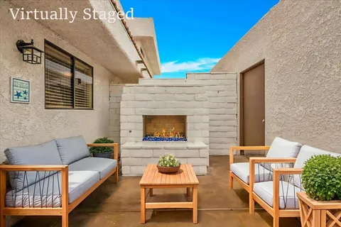 a building outdoor space with patio furniture