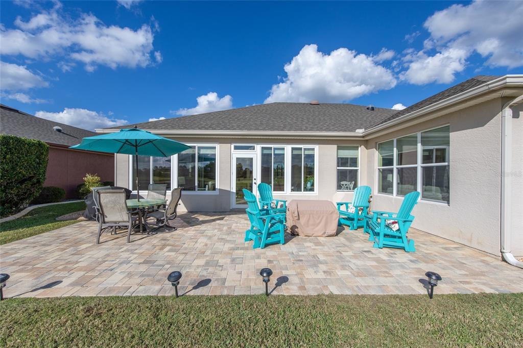 9479 Southwest 71st Loop Ocala, FL 34481 - Photo 55 of 84 a view of a house with patio