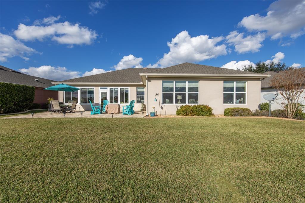 9479 Southwest 71st Loop Ocala, FL 34481 - Photo 65 of 84 a front view of house with yard and green space