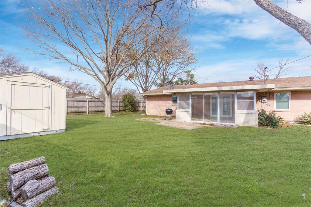 831 Warren Way Richardson, TX 75080 - Photo 18 of 18 a view of a house with a yard and sitting area