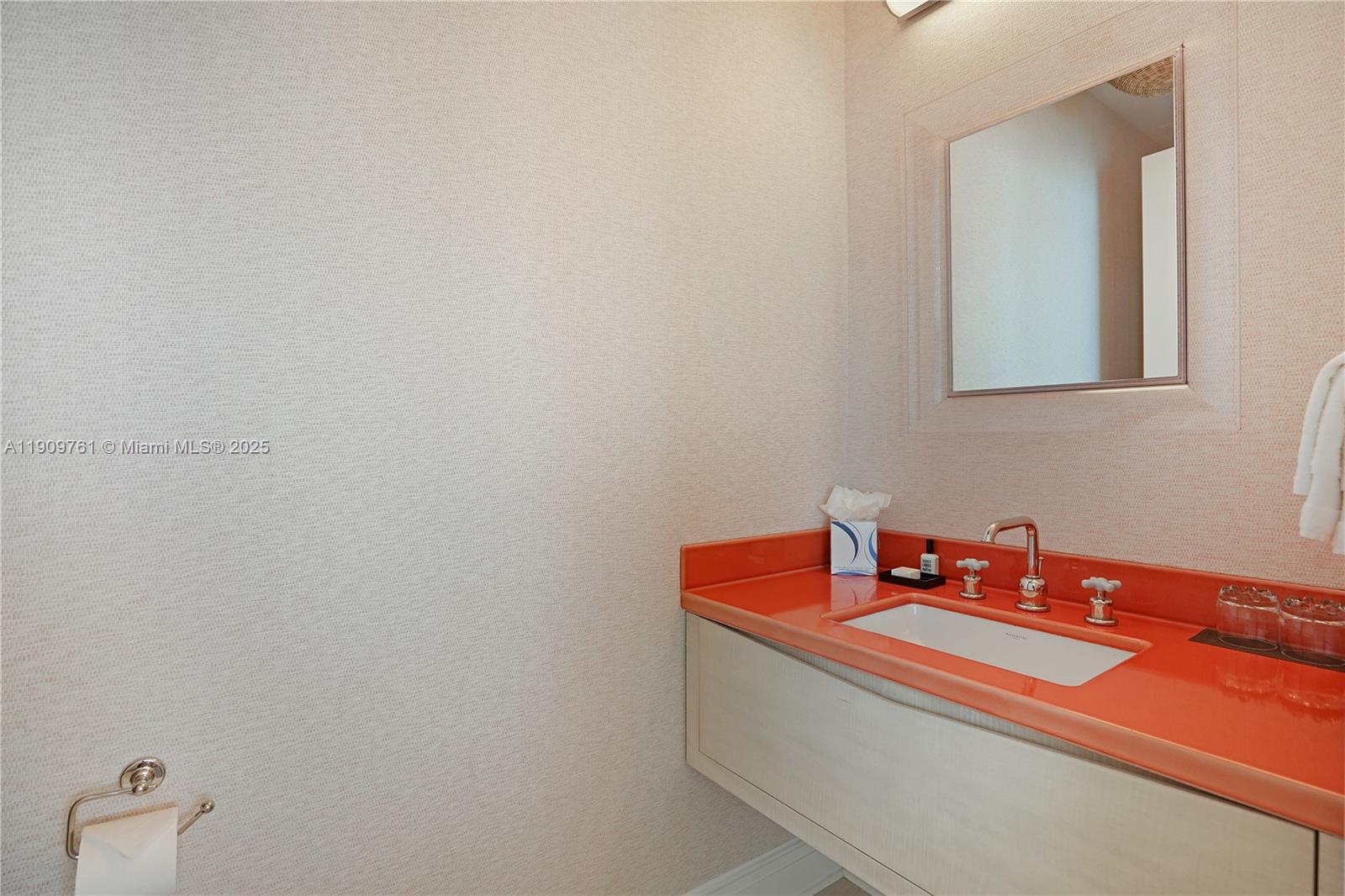 4401 Collins Avenue, Unit PHSOUTH Miami Beach, FL 33140 - Photo 21 of 92 a bathroom with a sink and a mirror