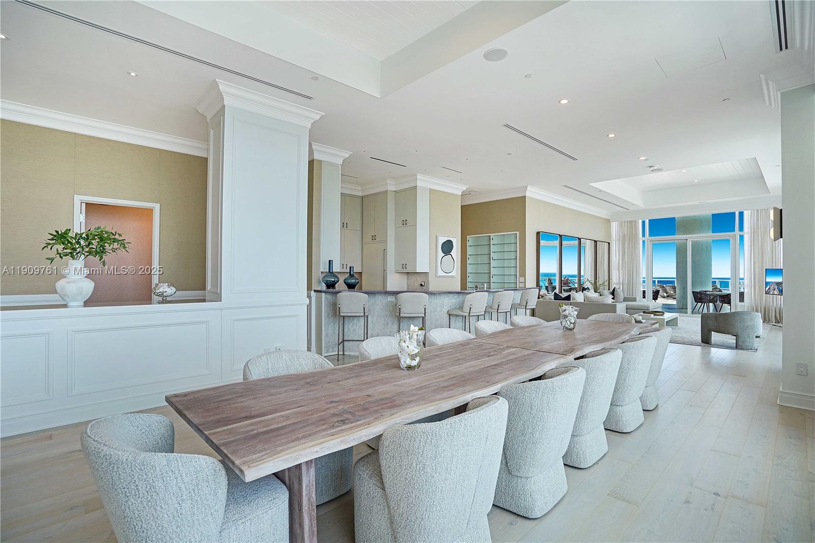 4401 Collins Avenue, Unit PHSOUTH Miami Beach, FL 33140 - Photo 25 of 92 a dining hall with stainless steel appliances granite countertop a kitchen island a stove and a sink