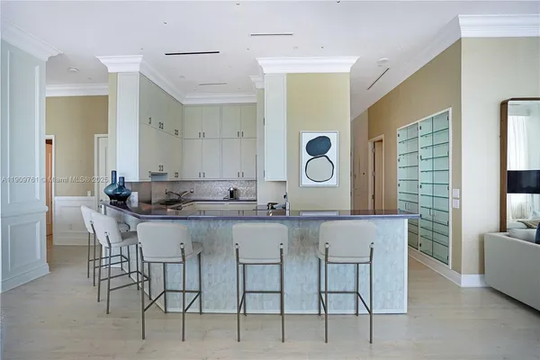 a bedroom with a bed and couch