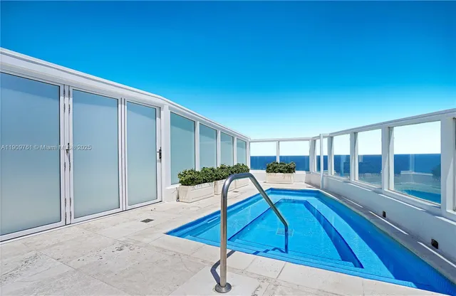 a bathroom with a toilet sink vanity and mirror