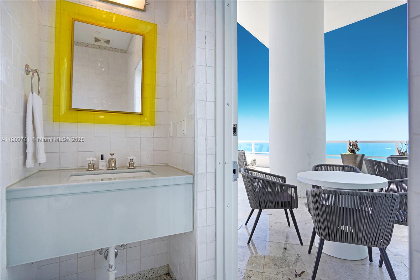 4401 Collins Avenue, Unit PHSOUTH Miami Beach, FL 33140 - Photo 45 of 92 a view of a dining room with a table and chairs