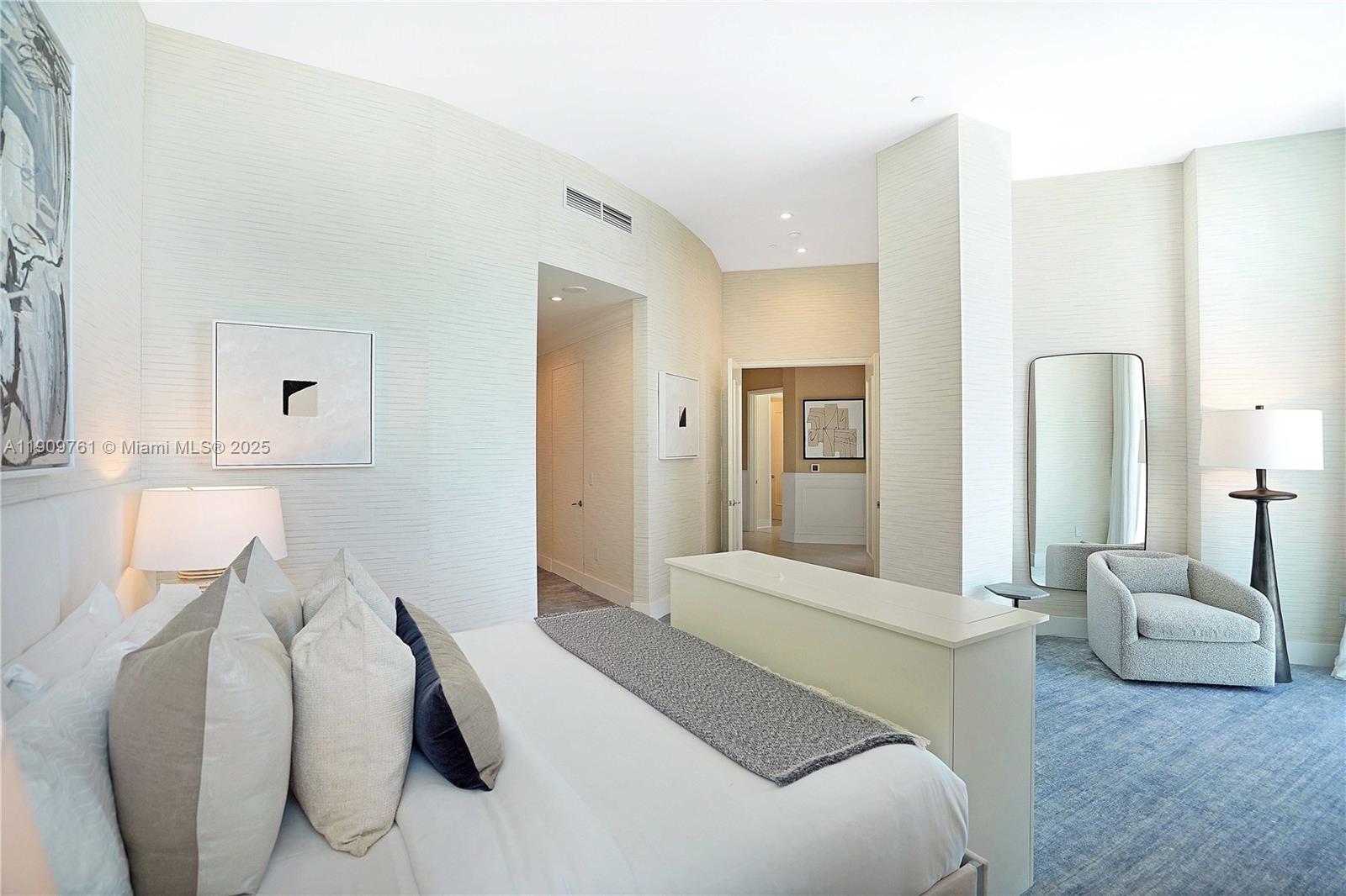 4401 Collins Avenue, Unit PHSOUTH Miami Beach, FL 33140 - Photo 47 of 92 a bedroom with a bed and couch