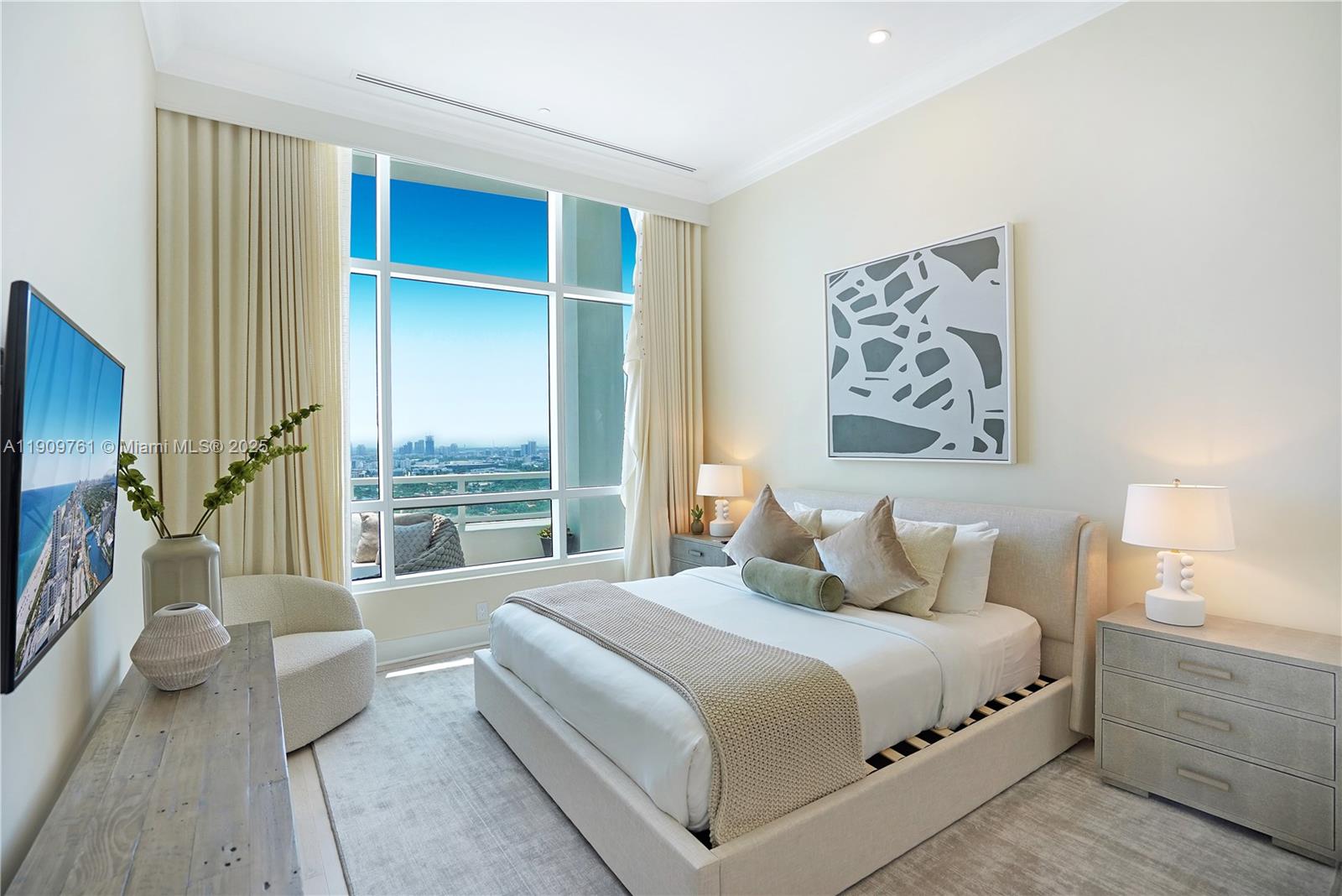 4401 Collins Avenue, Unit PHSOUTH Miami Beach, FL 33140 - Photo 57 of 92 a bedroom with a large bed and a couch