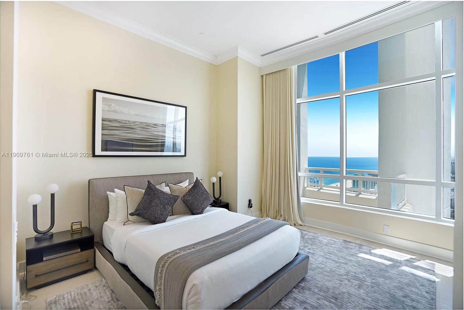 4401 Collins Avenue, Unit PHSOUTH Miami Beach, FL 33140 - Photo 70 of 92 a bedroom with a bed and a window