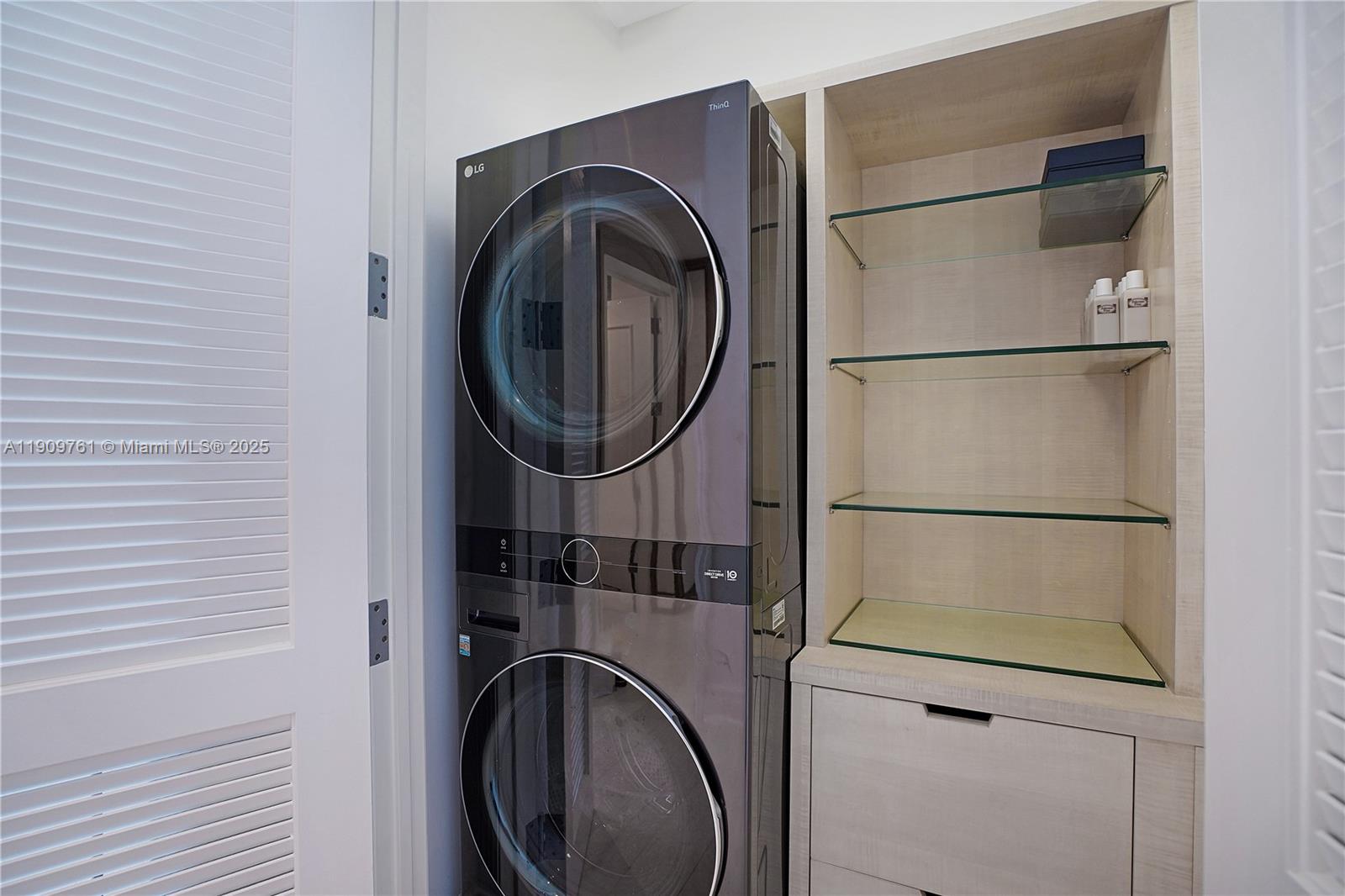 4401 Collins Avenue, Unit PHSOUTH Miami Beach, FL 33140 - Photo 78 of 92 a close view of a utility room with dryer and washer