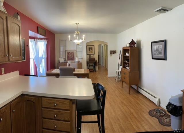 8650 Ulrich Road Germansville, PA 18053 - Photo 13 of 50 a view of a dining room with furniture and wooden floor