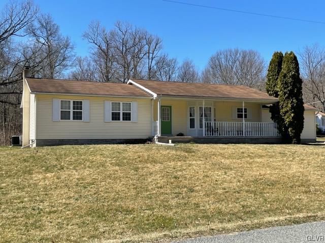 8650 Ulrich Road Germansville, PA 18053 - Photo 2 of 50 a house with trees in the background