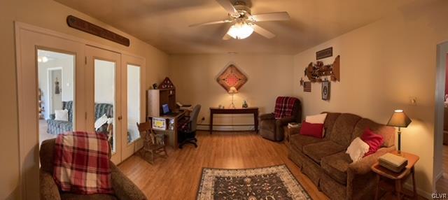 8650 Ulrich Road Germansville, PA 18053 - Photo 30 of 50 a living room with furniture and a chandelier