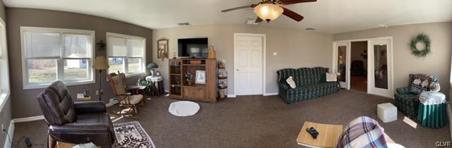 8650 Ulrich Road Germansville, PA 18053 - Photo 35 of 50 a living room with furniture and a chandelier