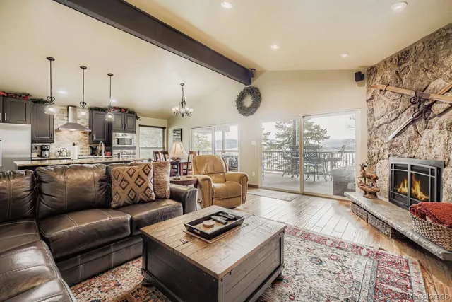 a kitchen with a table chairs and a stove