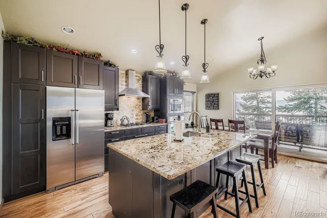 a view of a dining area with furniture window and wooden floor